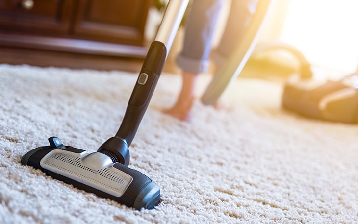 Vacuum cleaner on carpet